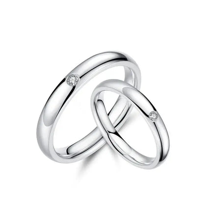 A sleek silver-toned jujutsu kaisen yuta okkotsu ring set with polished finish and small diamond accents for wedding jewelry