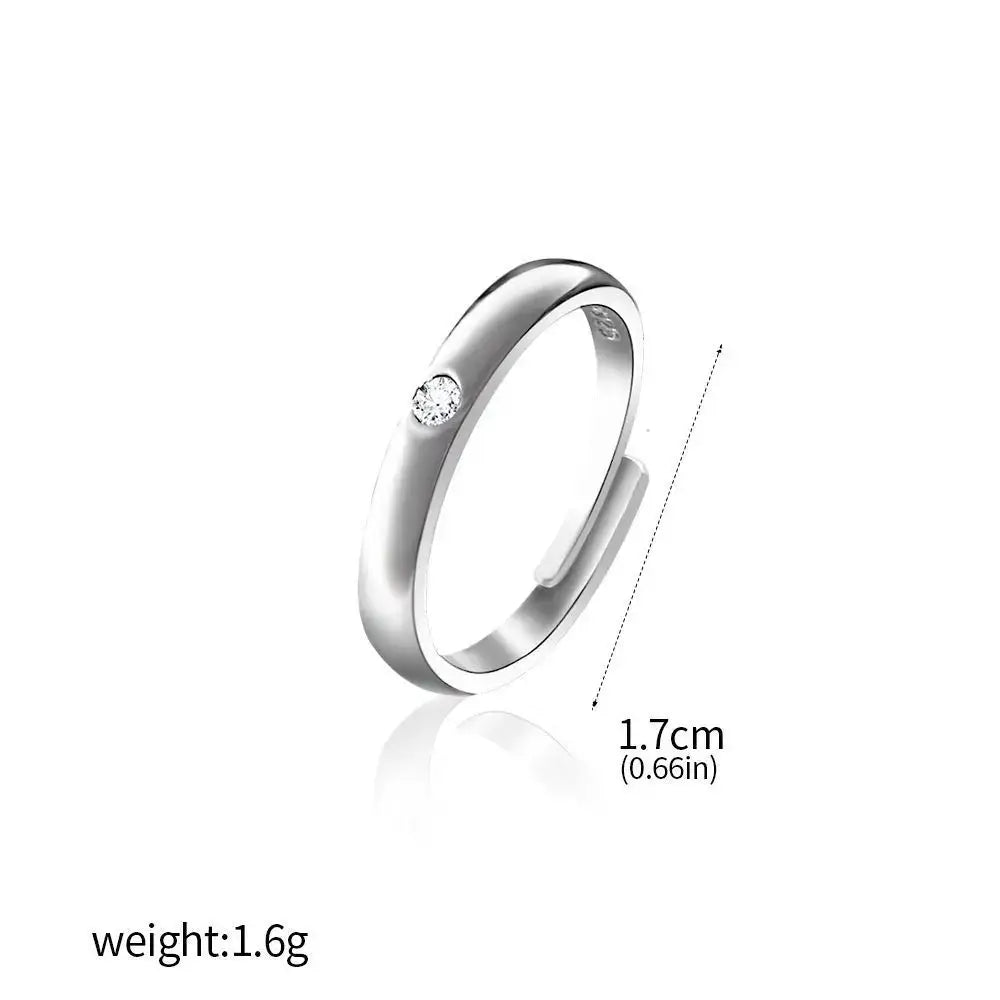 A sleek silver band ring set with a single round-cut clear gemstone for jujutsu kaisen yuta okkotsu cosplay