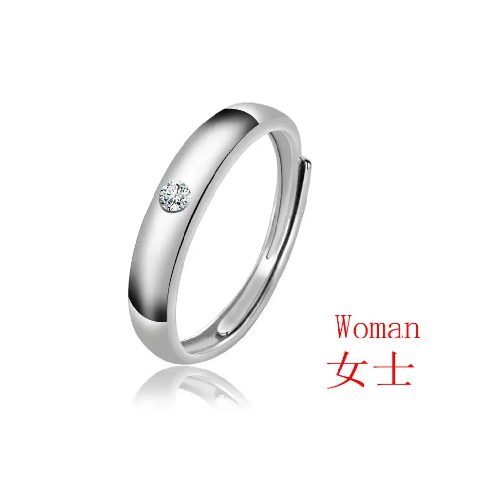 A sleek silver ring set featuring a single round-cut diamond inspired by jujutsu kaisen yuta okkotsu wedding jewelry