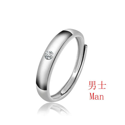 A sleek silver yuta okkotsu jujutsu kaisen ring set with a single round diamond on an adjustable band