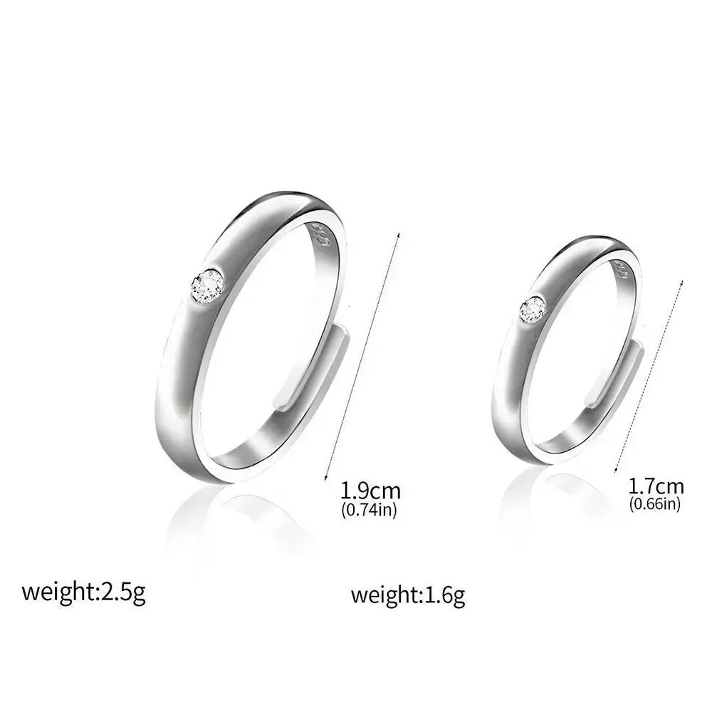 Silver adjustable jujutsu kaisen yuta okkotsu couple ring with a single round diamond set on the outer band