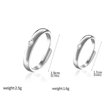 Silver adjustable jujutsu kaisen yuta okkotsu couple ring with a single round diamond set on the outer band