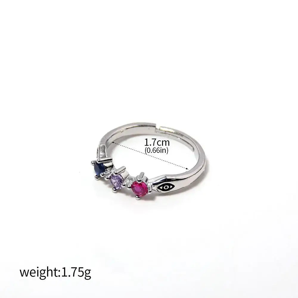 Silver-toned adjustable jujutsu kaisen yuta okkotsu couple ring with three colorful gemstones and eye motif on the side