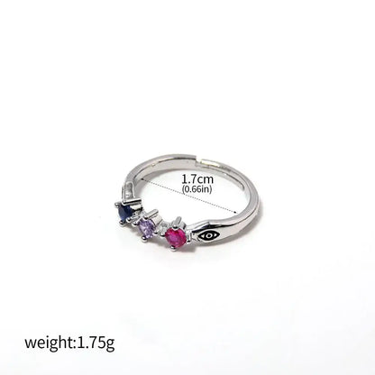 Silver-toned adjustable jujutsu kaisen yuta okkotsu couple ring with three colorful gemstones and eye motif on the side