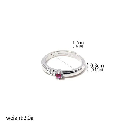 Silver adjustable jujutsu kaisen yuta okkotsu couple ring with a pink gemstone and clear accent stones on the band