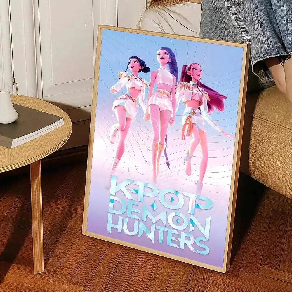 A framed k-pop demon hunters wall art sticker featuring three animated female characters in white and gold outfits