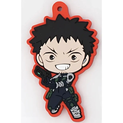 Black and orange kaiju no 8 character rubber keychain with chibi spiky hair holding futuristic weapon made of pvc material