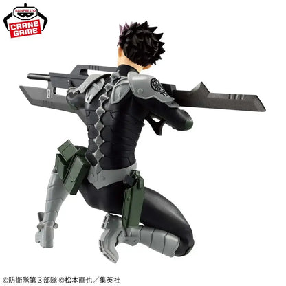 Kaiju no 8 gen narumi pvc figure 24cm showing black and gray armored figure kneeling with large weapon over shoulder