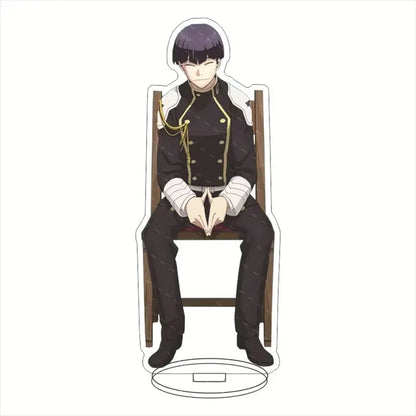 Black and white hibino kafka acrylic stand with gold trim seated on wooden chair 15cm desktop display acrylic stand