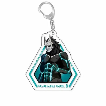 A hexagonal hibino reno acrylic keychain with black and teal anime character and glowing blue lines labeled kaiju no 8