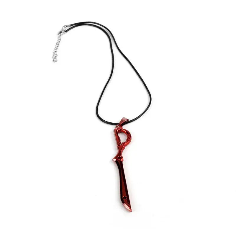Mini metal red scissor blade sword pendant in metallic red on black cord from kill la kill matoi ryuko keychain