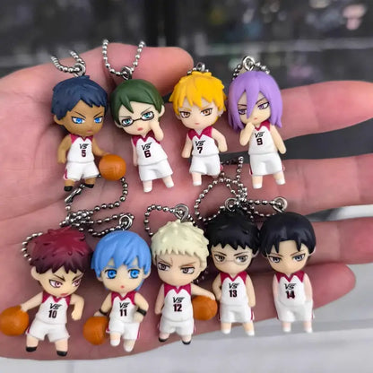 A collection of colorful chibi-style kuroko’s basketball kise ryota pvc keychains with distinct hair colors and jersey numbers