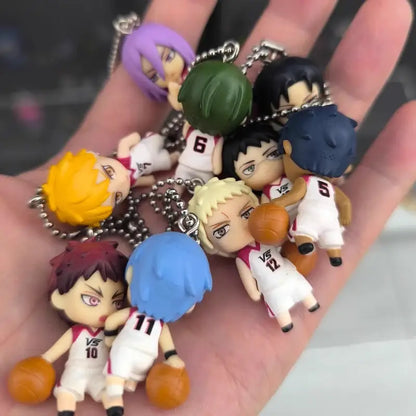 A collection of colorful chibi-style pvc keychains featuring kuroko’s basketball kise ryota in white and red uniforms