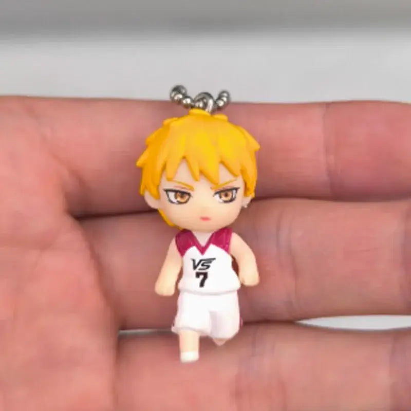 Kuroko’s basketball kise ryota pvc figure keychain with yellow hair wearing white and maroon basketball jersey number 7