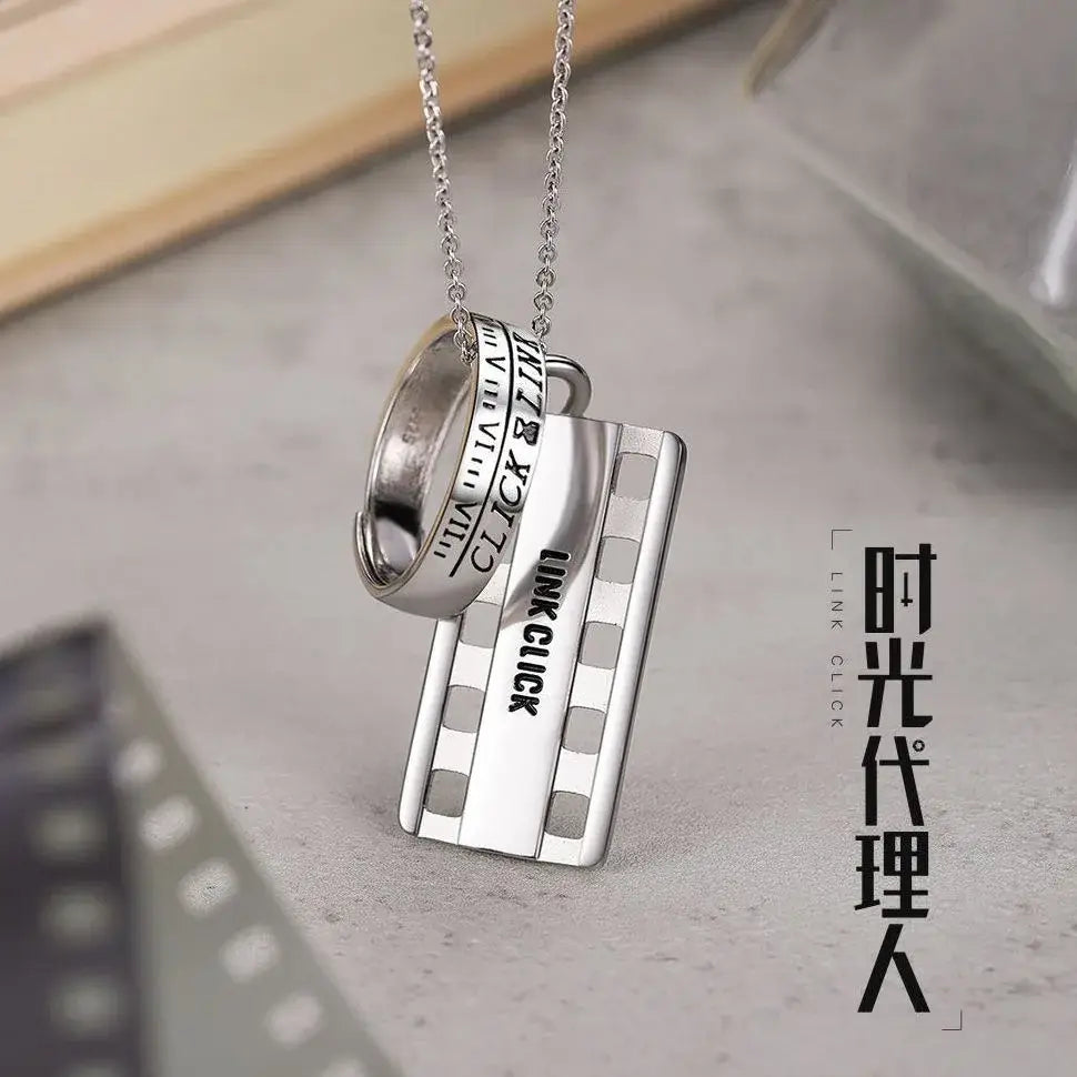 Silver film strip and ring necklace pendant with link click engraved on rectangular charm cosplay accessory