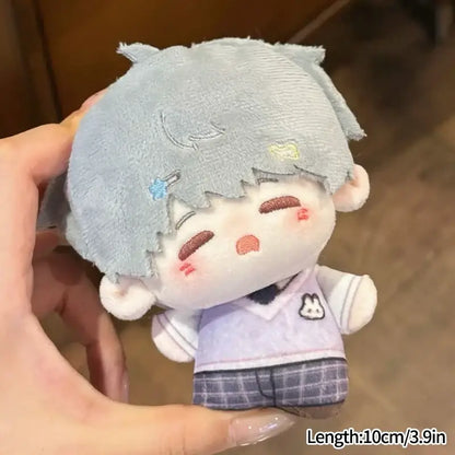 A light gray soft plush love and deepspace keychain with stitched face and star is a cute cartoon bag charm