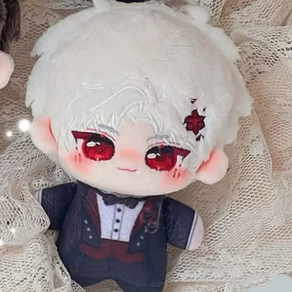 A plush bag charm with white fluffy hair and red eyes wearing a dark blue tuxedo cute cartoon keychain