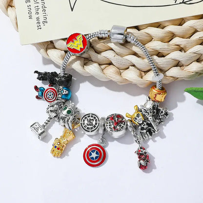 Silver and gold marvel superhero pendant bracelet featuring iconic charms like captain america shield and thor hammer