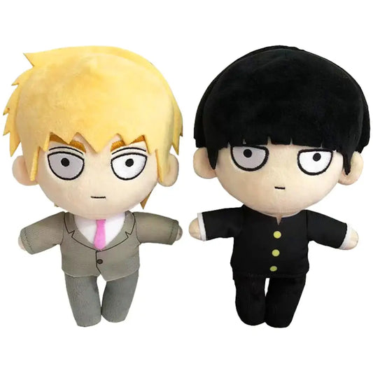 Two soft stuffed plush dolls featuring a blonde-haired figure in a grey suit and a black-haired figure in a black uniform with yellow buttons