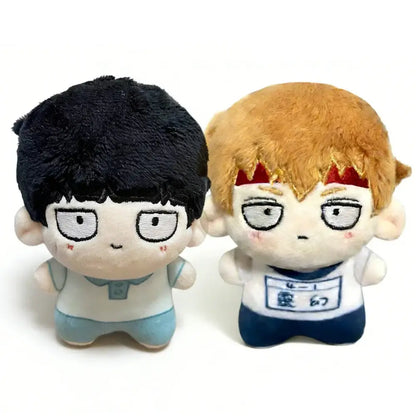 Two plush anime figures from mob psycho 100 featuring black and blonde hair as soft plush pendant keychains