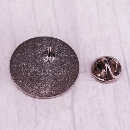 Silver-toned metal brooch with textured matte finish and clutch-back fastener for kageyama shigeo enamel pin fans