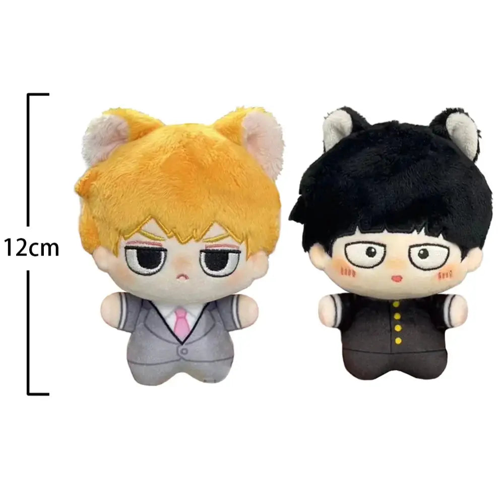 Two plush toy figures including a mob psycho kageyama shigeo plush keychain with golden and black hair colors