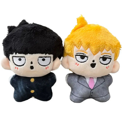 Two plush keychain figures with embroidered faces featuring kageyama shigeo bag pendant in black and gray suits