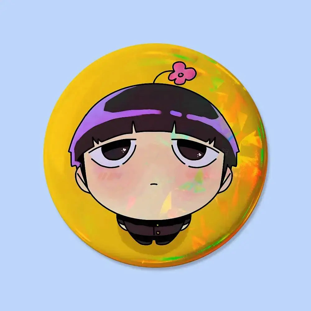 Mob psycho pin badge featuring a glossy yellow circular design with a chibi anime character and flower accessory