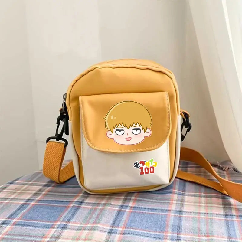 Yellow and white reigen arataka canvas crossbody bag with cartoon face front flap large capacity arataka canvas crossbody