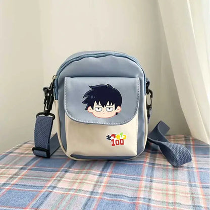 Light blue and cream reigen arataka canvas crossbody bag with mob psycho 100 cartoon face on front flap