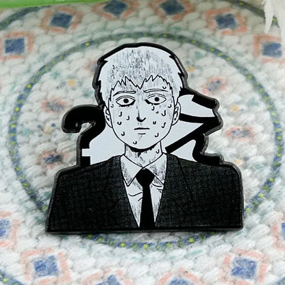Black and white enamel lapel pin featuring reigen arataka from mob psycho 100 in suit and tie design