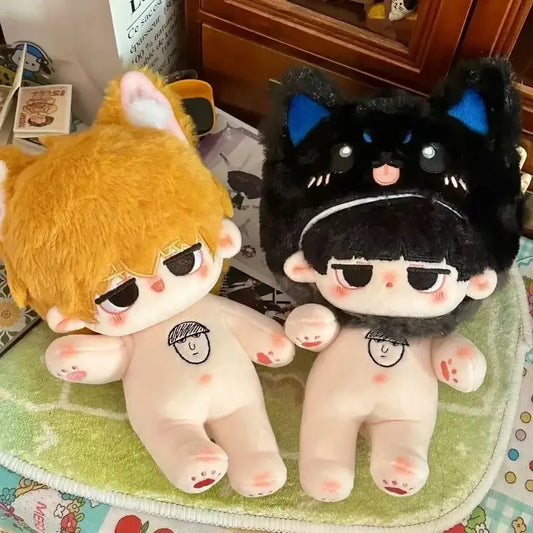 Two plush dolls featuring reigen arataka with orange hair and a black cat-eared hood cosplay plush mob psycho 100