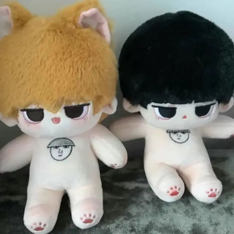 Two mob psycho cosplay plush dolls featuring reigen arataka with golden and black hair made of soft fabric