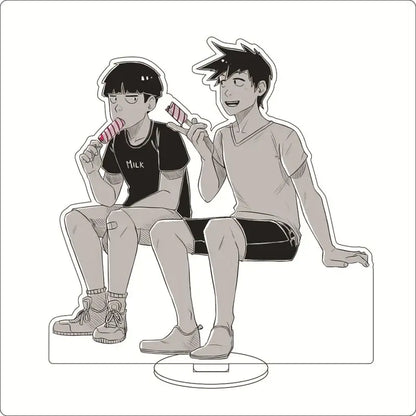 Clear acrylic mob psycho acrylic ornament featuring shigeo kageyama sitting with anime character holding striped popsicles