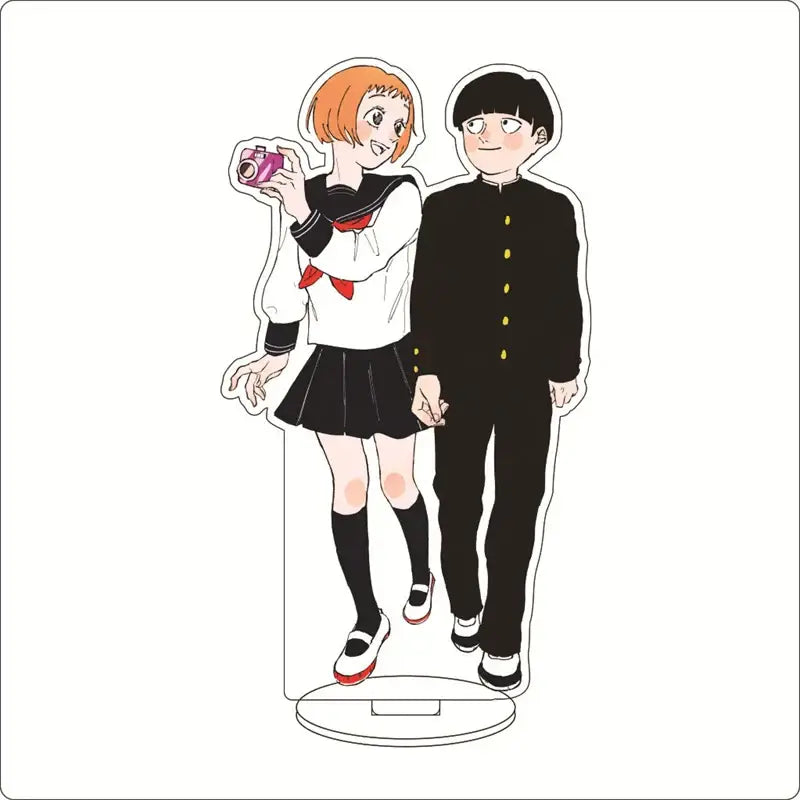 Clear acrylic ornament of mob psycho featuring shigeo kageyama and another character in school uniforms with pink camera