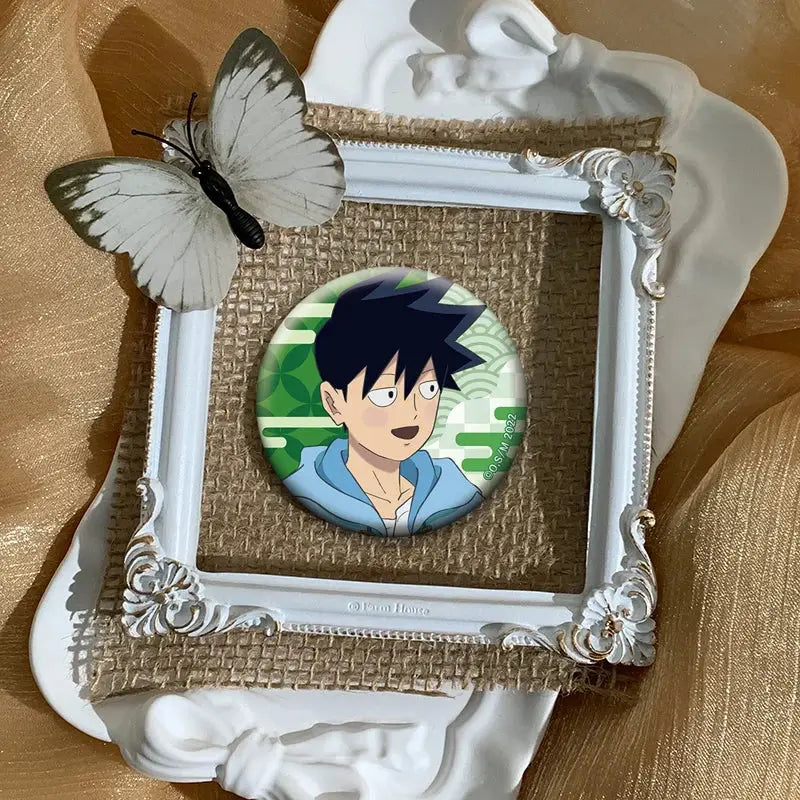 Mob psycho 100 shigeo kageyama button pin featuring a boy with black hair and blue hoodie in an ornate white frame