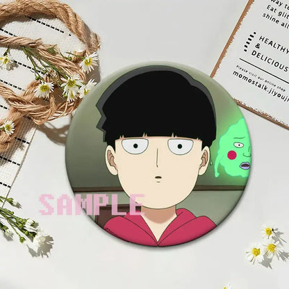 Circular mob psycho 100 shigeo kageyama button pin featuring anime character with black hair and red hoodie on green background