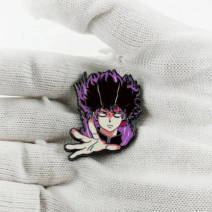 Purple and black enamel mob psycho shigeo kageyama enamel pin featuring a stylized anime character with spiky hair and outstretched hand