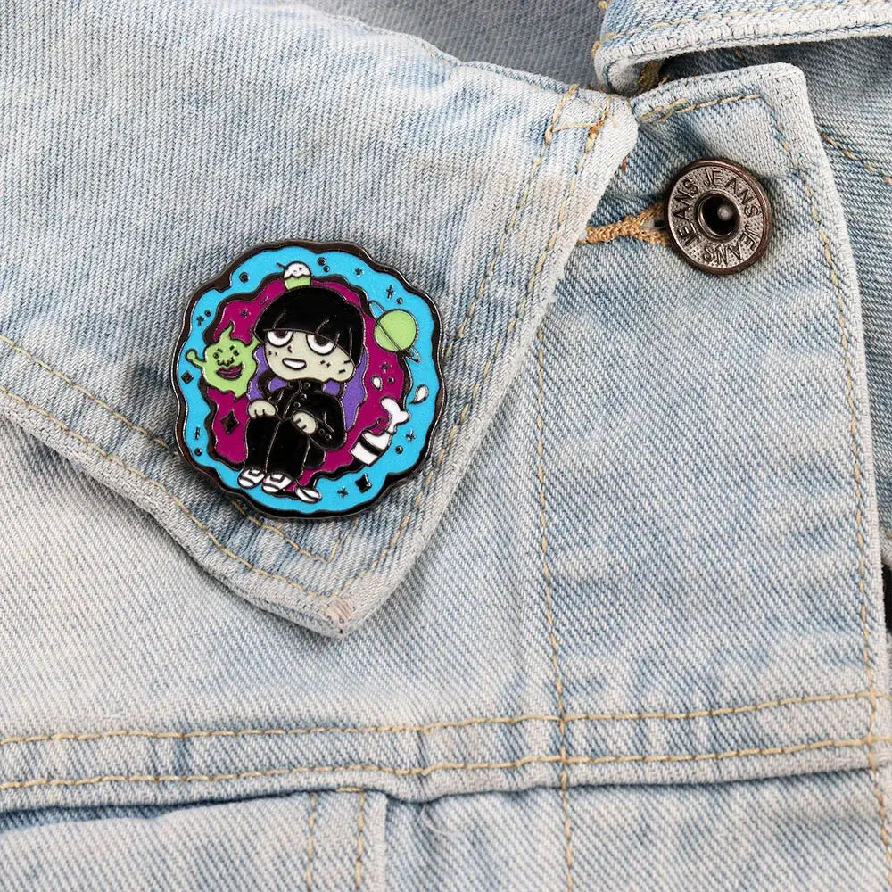 A colorful scalloped-edge enamel floating badge of shigeo kageyama with a green alien and cosmic background