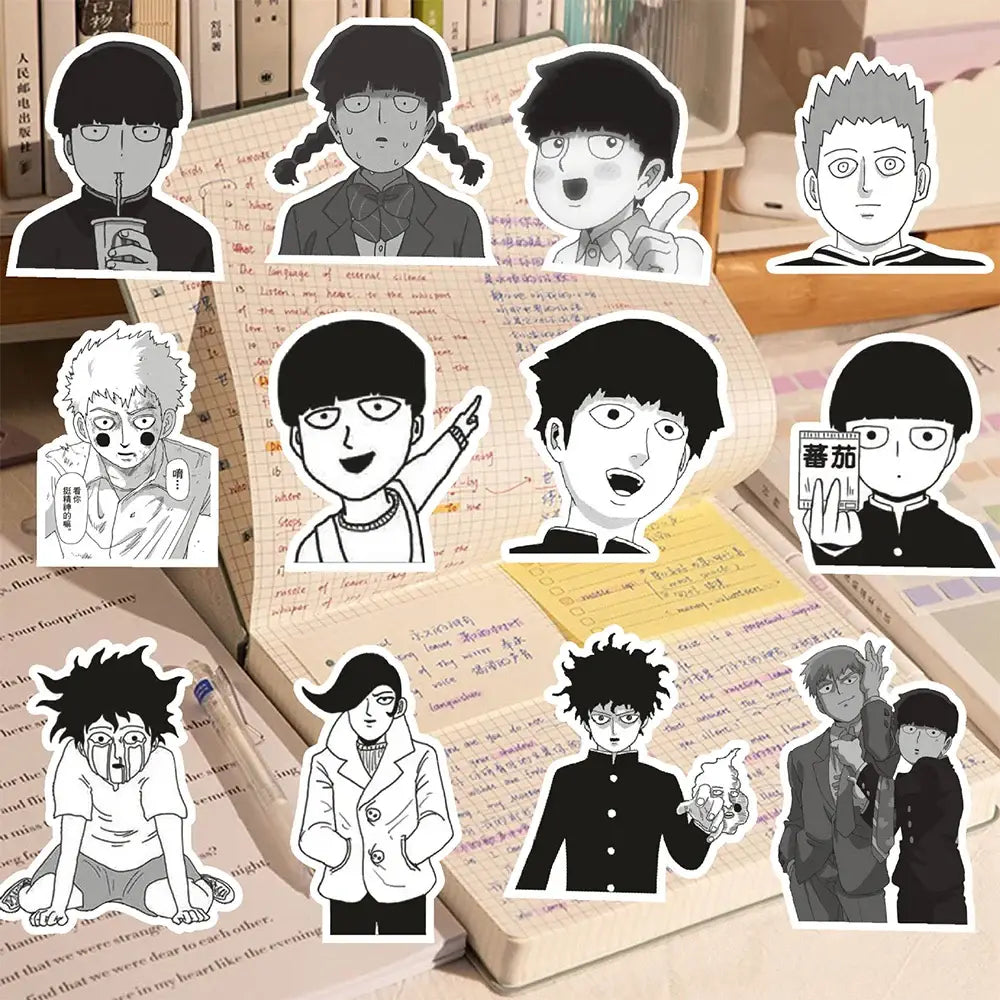 Black-and-white jujutsu kaisen anime character stickers arranged on an open notebook in a shigeo kageyama sticker set