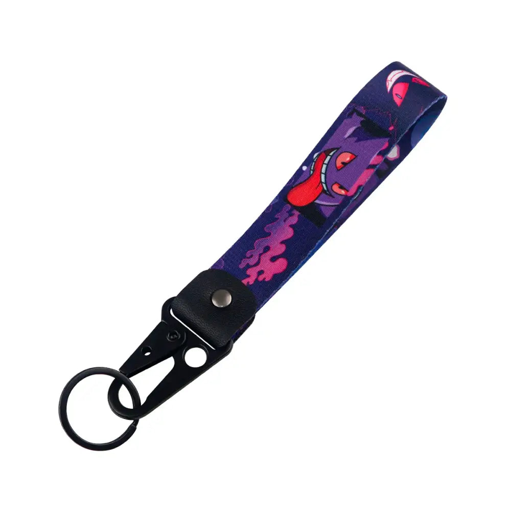 Purple and pink anime monster cartoon on dark blue fabric wrist strap with black metal clip for monster original keychain