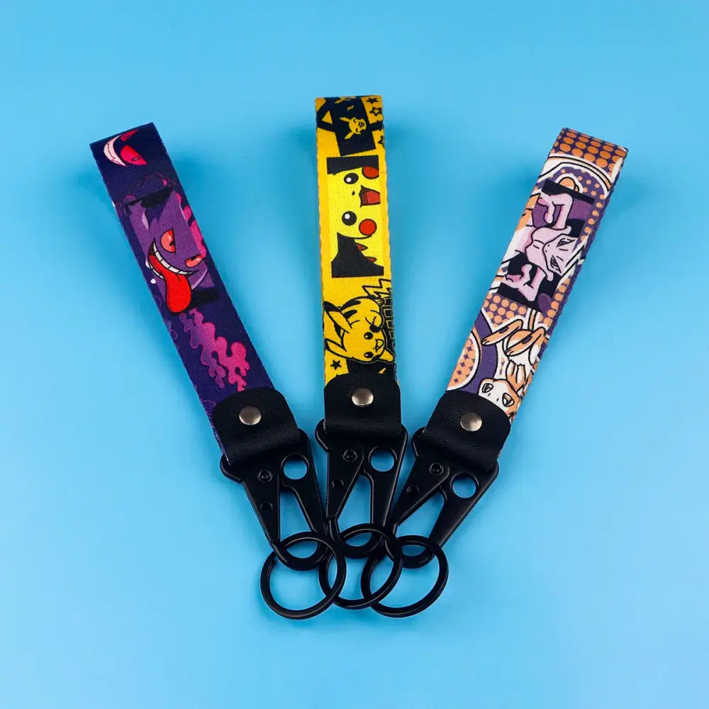 Three colorful pokémon-themed monster original keychain wristlet keychains with black metal clasps for car key accessory