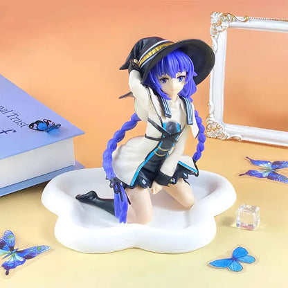 A detailed mushoku tensei eris boreas greyrat pvc figure with vibrant blue hair and a black witch hat