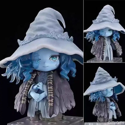 Chibi-style eris greyrat pvc statue from mushoku tensei with blue skin teal eyes and layered dark gray cloak