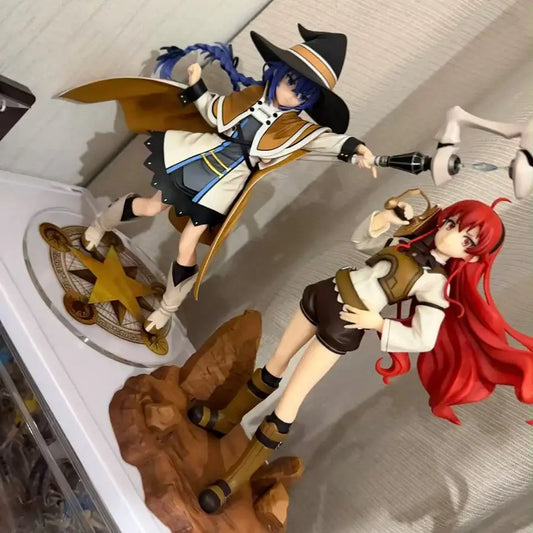 Blue-haired roxy migurdia pvc figure in black hat and brown coat on golden star base roxy migurdia noodle stopper
