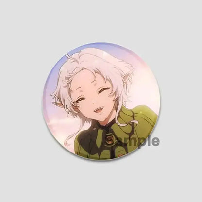 Circular handmade tinplate pin badge featuring roxy migurdia with silver hair and green jacket against pastel sky