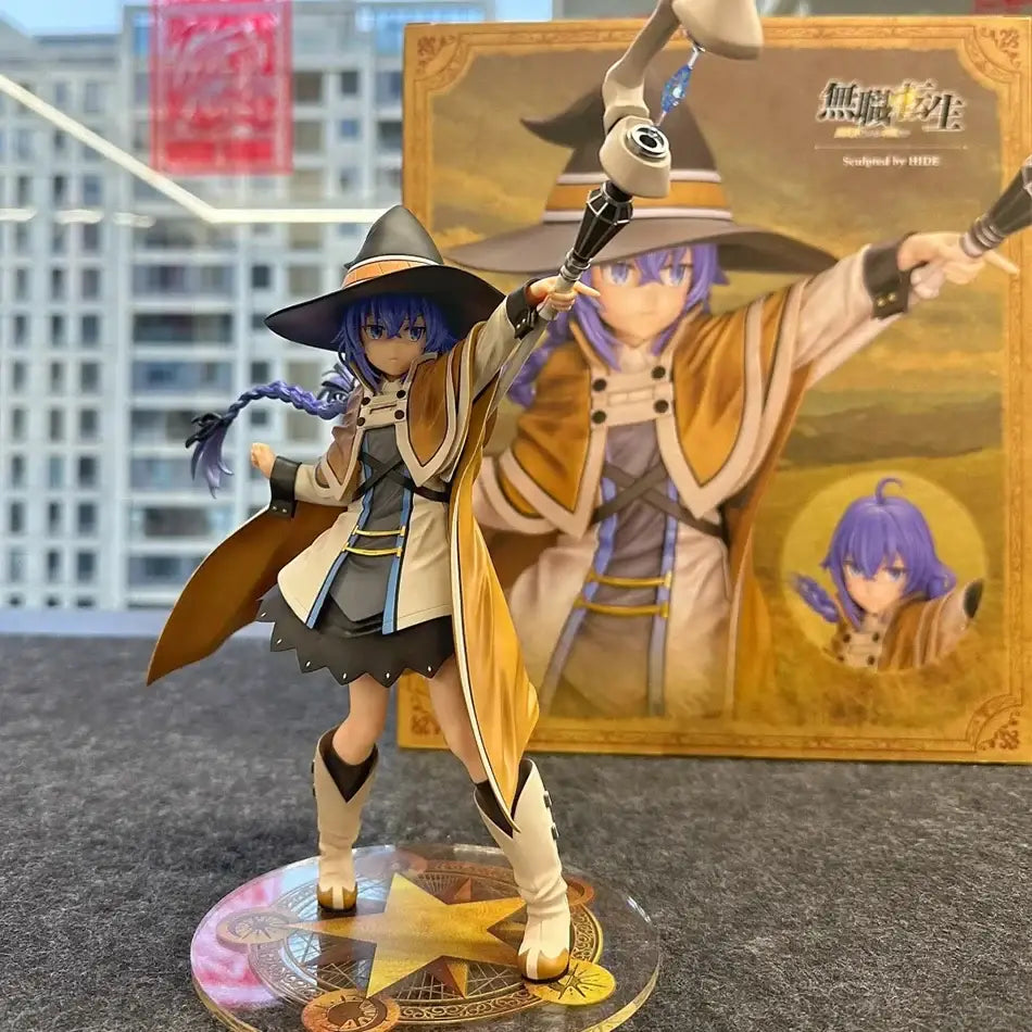 Detailed roxy migurdia pvc figure featuring a blue-haired witch in a black hat and tan coat holding two staffs
