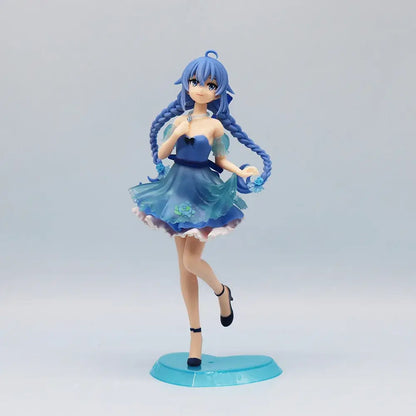 Roxy migurdia anime figure from mushoku tensei in a layered blue and teal dress on a translucent turquoise base