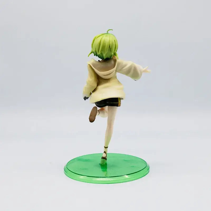 Green-haired roxy migurdia anime figure in beige hoodie and black shorts on translucent green base from mushoku tensei