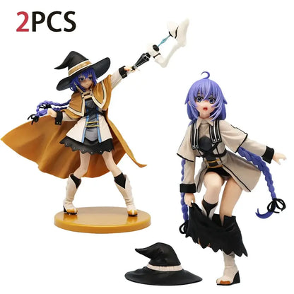 Two mushoku tensei roxy migurdia pvc figurines in tan and beige outfits with weapons on golden bases made of plastic